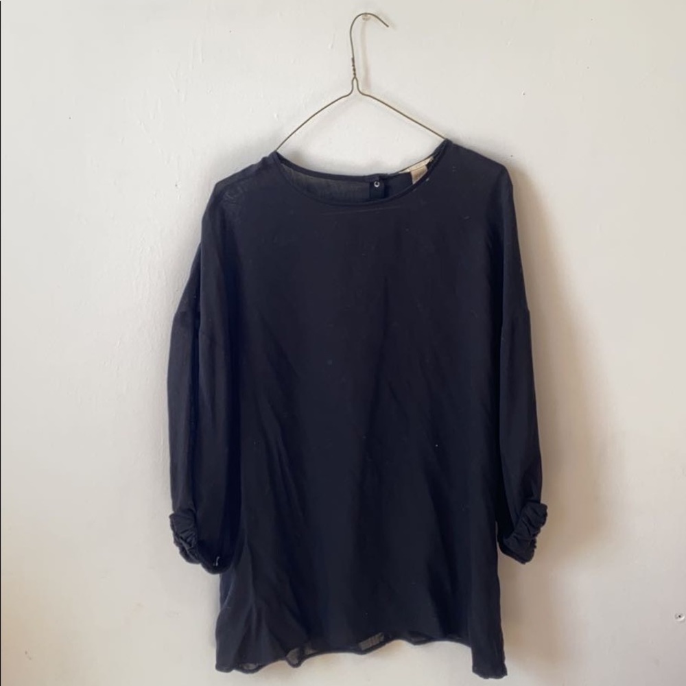 Black blouse with dropped “rolled up” sleeves that can’t be unrolled